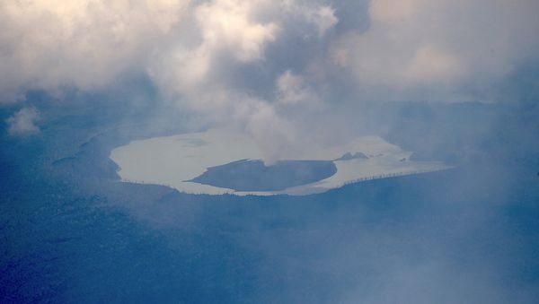 Smoke emanates from the Manaro Voui volcano located on Vanuatu's northern island Ambae in the South Pacific, in this aerial photo - Sputnik International