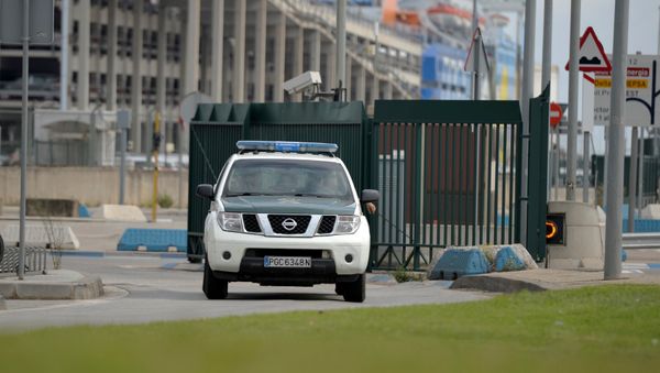 A Spanish civil guard vehicle leaves the port area where two ferries rented by Spain to house hundreds of Spanish national police and civil guard reinforcements are docked a day before the banned October 1 independence referendum, in Barcelona, Spain, September 30, 2017 A Spanish civil guard vehicle leaves the port area where two ferries rented by Spain to house hundreds of Spanish national police and civil guard reinforcements are docked a day before the banned October 1 independence referendum, in Barcelona, Spain, September 30, 2017 - Sputnik International