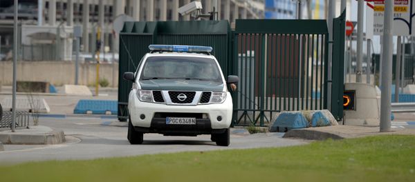A Spanish civil guard vehicle leaves the port area where two ferries rented by Spain to house hundreds of Spanish national police and civil guard reinforcements are docked a day before the banned October 1 independence referendum, in Barcelona, Spain, September 30, 2017 - Sputnik International