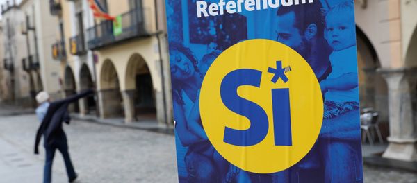A pro-independence referendum campaign banner hangs in the birthplace of Catalan President Carles Puigdemont, the Catalan town of Amer, Spain, September 30, 2017. A pro-independence referendum campaign banner hangs in the birthplace of Catalan President Carles Puigdemont, the Catalan town of Amer, Spain, September 30, 2017. - Sputnik International