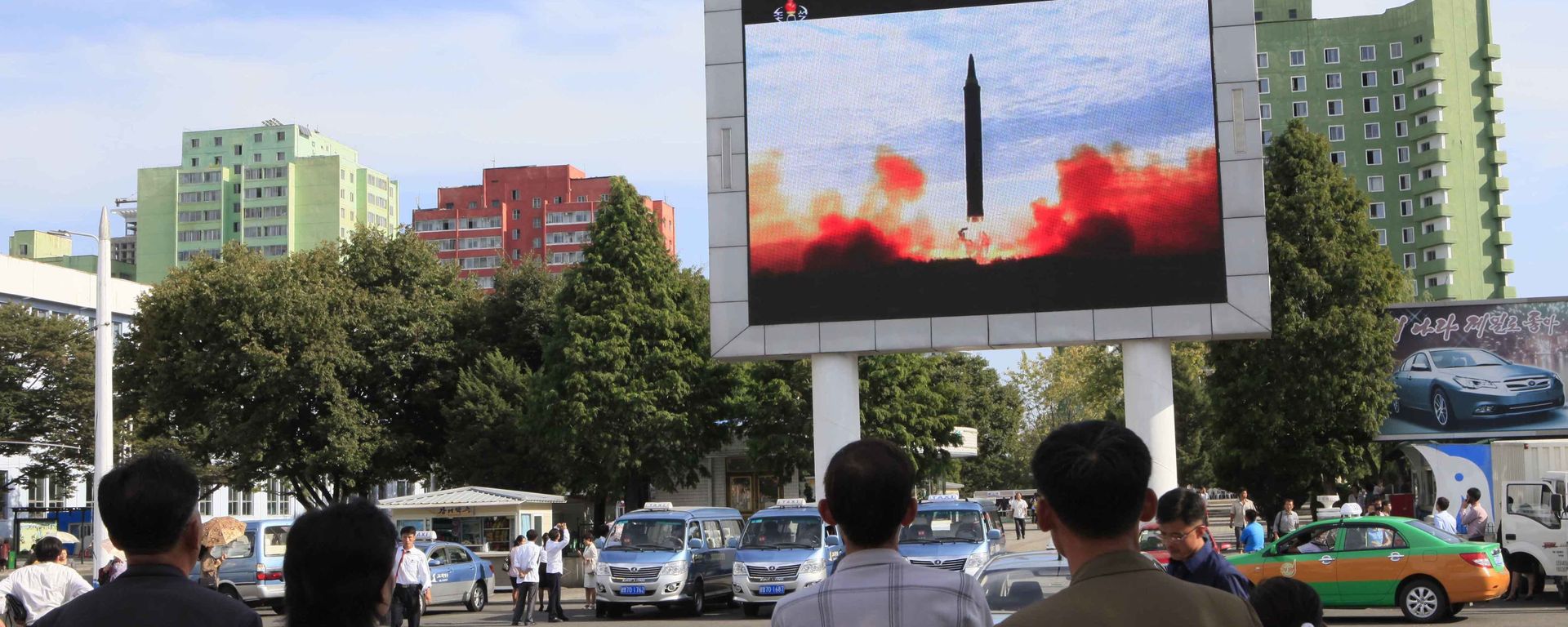 People watch a launching of a Hwasong-12 strategic ballistic rocket aired on a public TV screen at the Pyongyang Train Station in Pyongyang, North Korea, Saturday, Sept. 16, 2017 People watch a launching of a Hwasong-12 strategic ballistic rocket aired on a public TV screen at the Pyongyang Train Station in Pyongyang, North Korea, Saturday, Sept. 16, 2017 - Sputnik International, 1920, 13.07.2023