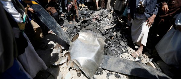 People gather around the engine of a drone aircraft which the Houthi rebels said they have downed in Sanaa, Yemen October 1, 2017 People gather around the engine of a drone aircraft which the Houthi rebels said they have downed in Sanaa, Yemen October 1, 2017 - Sputnik International