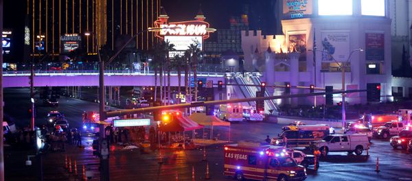 Las Vegas Metro Police and medical workers stage in the intersection of Tropicana Avenue and Las Vegas Boulevard South after a mass shooting at a music festival on the Las Vegas Strip in Las Vegas, Nevada, U.S. October 1, 2017 Las Vegas Metro Police and medical workers stage in the intersection of Tropicana Avenue and Las Vegas Boulevard South after a mass shooting at a music festival on the Las Vegas Strip in Las Vegas, Nevada, U.S. October 1, 2017 - Sputnik International