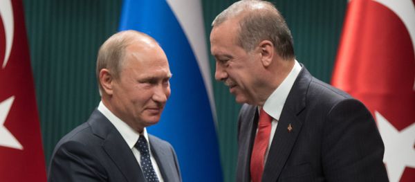 Russian President Vladimir Putin and Turkish President Recep Tayyip Erdogan, right, at a news conference following the Russian-Turkish talks in Ankara - Sputnik International