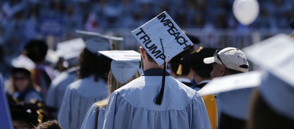 A student wears a hat reading Impeach Trump during a graduation ceremony at Columbia University in New York, Wednesday, May 17, 2017 - Sputnik International