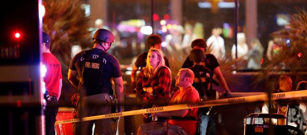 People wait in a medical staging area on October 2, 2017, after a mass shooting during a music festival in Las Vegas, Nevada, U.S - Sputnik International
