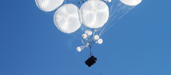 Airborne combat vehicles air dropped during the joint battalion tactical exercise of airborne troops from Russia, Belarus and Serbia at Rayevsky military base outside Novorossiysk - Sputnik International