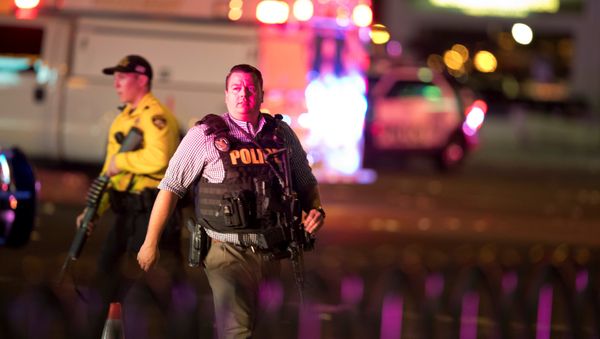 Law enforcement officers are shown on Las Vegas Boulevard South on October 2, 2017, after a mass shooting during a music festival in Las Vegas, Nevada, U.S. Law enforcement officers are shown on Las Vegas Boulevard South on October 2, 2017, after a mass shooting during a music festival in Las Vegas, Nevada, U.S. - Sputnik International