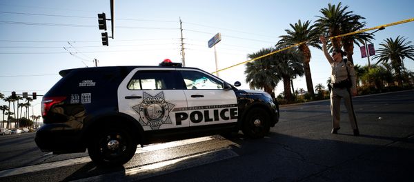 A police vehicle enters the site of the mass shooing at the Route 91 Harvest Country Music Festival on the Las Vegas Strip in Las Vegas, Nevada, U.S A police vehicle enters the site of the mass shooing at the Route 91 Harvest Country Music Festival on the Las Vegas Strip in Las Vegas, Nevada, U.S - Sputnik International