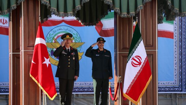 Turkish Chief of Staff General Hulusi Akar meets with his Iranian counterpart Major General Mohammad Baqeri in Tehran, Iran, October 2, 2017 - Sputnik International