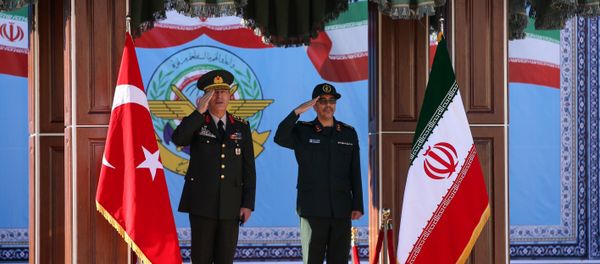 Turkish Chief of Staff General Hulusi Akar meets with his Iranian counterpart Major General Mohammad Baqeri in Tehran, Iran, October 2, 2017 Turkish Chief of Staff General Hulusi Akar meets with his Iranian counterpart Major General Mohammad Baqeri in Tehran, Iran, October 2, 2017 - Sputnik International