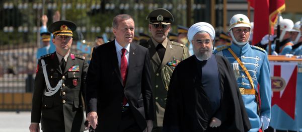 Turkey's President Recep Tayyip Erdogan, left, and Iran's President Hassan Rouhani inspect a military honour guard during a welcome ceremony in Ankara, Turkey, Saturday, April 16, 2016 Turkey's President Recep Tayyip Erdogan, left, and Iran's President Hassan Rouhani inspect a military honour guard during a welcome ceremony in Ankara, Turkey, Saturday, April 16, 2016 - Sputnik International