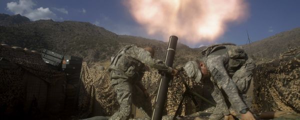 US soldiers from the 2nd Battalion, 12th Infantry Regiment, 4th Brigade Combat Team, fire mortars at known enemy firing positions from a base in the Pech River Valley in Afghanistan's Kunar province, Saturday, Oct. 24, 2009. - Sputnik International