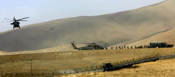 A Turkish military chopper, moving soldiers to the frontier, lands in a mountainous district of Yuksekova, in the Hakkari province, near the Turkish-Iraqi-Iranian border, southeastern Turkey (File) - Sputnik International