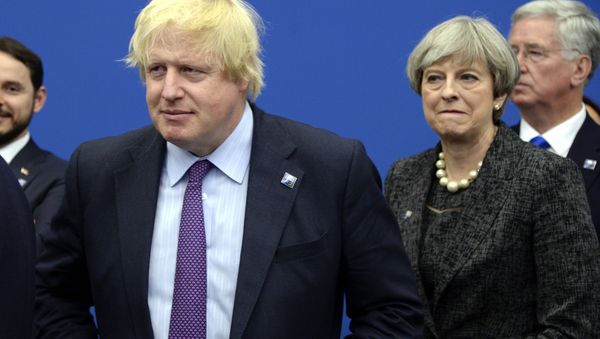 British Foreign Secretary Boris Johnson, left and Britain's Prime Minister Theresa May arrive for a meeting during the NATO summit of heads of state and government, at the NATO headquarters, in Brussels on Thursday, May 25, 2017. British Foreign Secretary Boris Johnson, left and Britain's Prime Minister Theresa May arrive for a meeting during the NATO summit of heads of state and government, at the NATO headquarters, in Brussels on Thursday, May 25, 2017. - Sputnik International