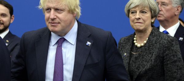 British Foreign Secretary Boris Johnson, left and Britain's Prime Minister Theresa May arrive for a meeting during the NATO summit of heads of state and government, at the NATO headquarters, in Brussels on Thursday, May 25, 2017. - Sputnik International
