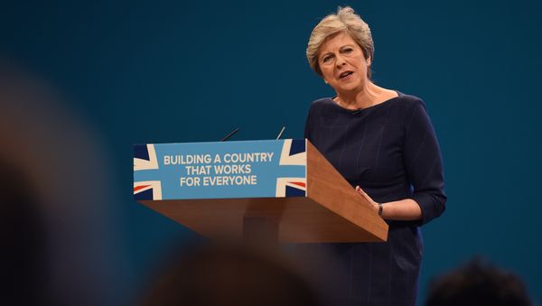 Britain's Prime Minister Theresa May delivers her speech on the final day of the Conservative Party annual conference at the Manchester Central Convention Centre in Manchester, northwest England Britain's Prime Minister Theresa May delivers her speech on the final day of the Conservative Party annual conference at the Manchester Central Convention Centre in Manchester, northwest England - Sputnik International