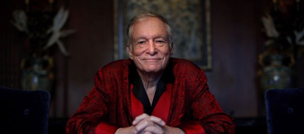 In this Nov. 4, 2010, file photo, Playboy magazine founder Hugh Hefner poses for photos at the Playboy Mansion in Los Angeles. - Sputnik International