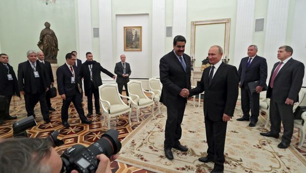 President Vladimir Putin meets with President of Venezuela Nicolas Maduro President Vladimir Putin meets with President of Venezuela Nicolas Maduro - Sputnik International