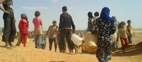 Syrian refugees gather for water at the Rukban refugee camp in Jordan's northeast border with Syria (File) - Sputnik International