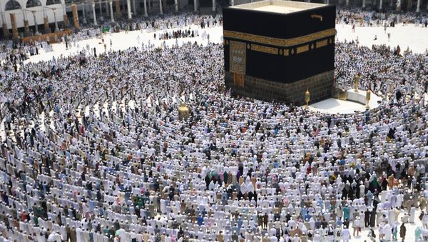 Pilgrims during hajj stand for prayer around the Kaaba at the Al-Masjid al-Haram mosque in Mecca. (File) - Sputnik International
