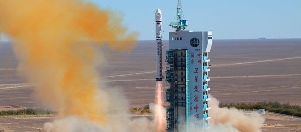 (File) A Chinese rocket takes off with the Venezuelan earth observation satellite Miranda from the remote Gobi desert in Jiuquan, northwest China's Gansu province on September 29, 2012 - Sputnik International