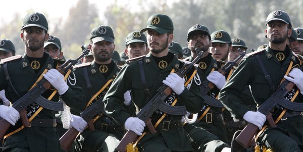 In this picture taken on Sunday, Sept. 21, 2008, Iranian Revolutionary Guards members march during a parade ceremony, marking the 28th anniversary of the onset of the Iran-Iraq war (1980-1988), in front of the mausoleum of the late revolutionary founder Ayatollah Ruhollah Khomeini, just outside Tehran, Iran - Sputnik International