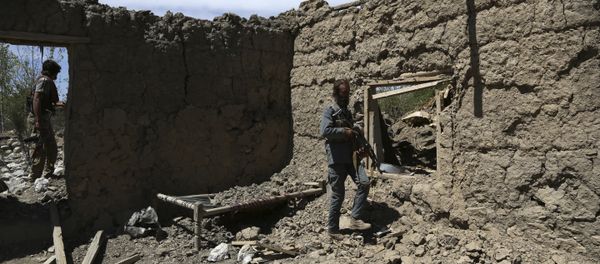 Afghan security police stand guard at the destroyed house after an operation in Asad Khil near the site of a U.S. bombing in the Achin district of Jalalabad, east of Kabul, Afghanistan Afghan security police stand guard at the destroyed house after an operation in Asad Khil near the site of a U.S. bombing in the Achin district of Jalalabad, east of Kabul, Afghanistan - Sputnik International