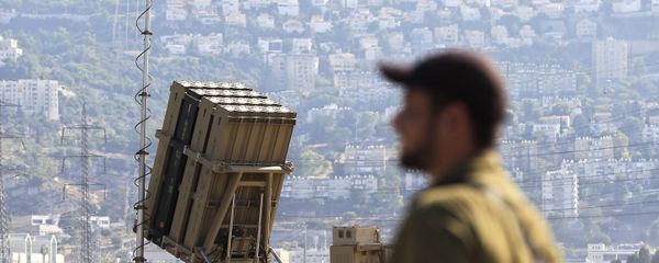 An Israeli soldier is seen next to an Iron Dome rocket interceptor battery deployed near the northern Israeli city of Haifa, Wednesday, Aug. 28, 2013. An Israeli soldier is seen next to an Iron Dome rocket interceptor battery deployed near the northern Israeli city of Haifa, Wednesday, Aug. 28, 2013. - Sputnik International