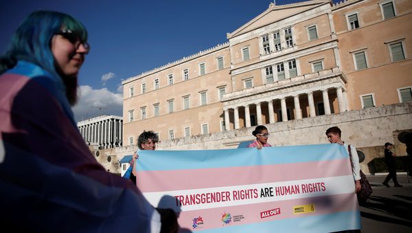 Protesters take part in a demonstration as the Greek Parliament debates bill allowing people to choose legal gender, in Athens, Greece, October 9, 2017. Protesters take part in a demonstration as the Greek Parliament debates bill allowing people to choose legal gender, in Athens, Greece, October 9, 2017. - Sputnik International
