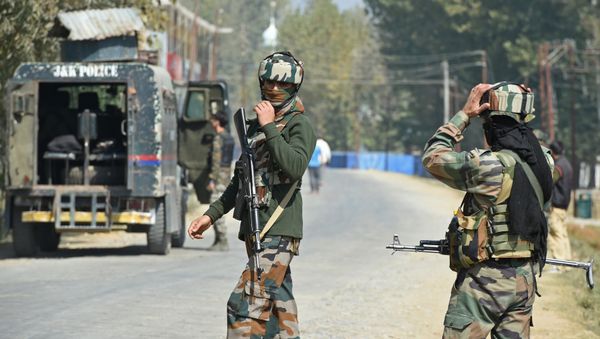 Indian paramilitary troopers stands guard after a gunfight with militants at Hajin village of Kashmir's Bandipora district, north of Srinagar Indian paramilitary troopers stands guard after a gunfight with militants at Hajin village of Kashmir's Bandipora district, north of Srinagar - Sputnik International
