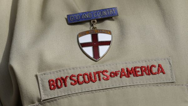 File - In this Feb. 4, 2013 file photo, shows a close up detail of a Boy Scout uniform worn during a news conference in front of the Boy Scouts of America headquarters in Irving, Texas. - Sputnik International