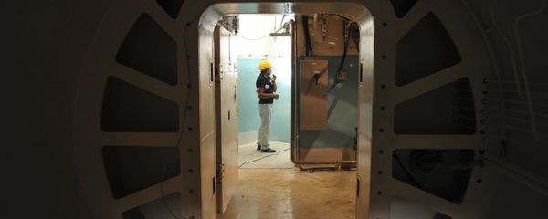 A worker stands at the entrance of the reactor of Bushehr nuclear power plant, outside the southern city of Bushehr, Iran (File) A worker stands at the entrance of the reactor of Bushehr nuclear power plant, outside the southern city of Bushehr, Iran (File) - Sputnik International