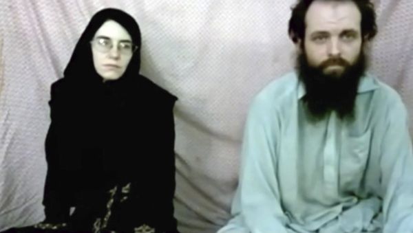 This still image made from a 2013 video released by the Coleman family shows Caitlan Coleman and her husband, Canadian Joshua Boyle in a militant video given to the family - Sputnik International