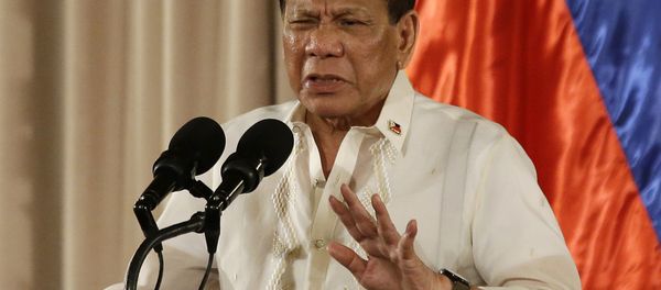 In this Aug. 16, 2017, photo, Philippine President Rodrigo Duterte gestures during the 19th Founding Anniversary of the Volunteers Against Crime and Corruption at the Malacanang Presidential Palace in Manila, Philippines. In this Aug. 16, 2017, photo, Philippine President Rodrigo Duterte gestures during the 19th Founding Anniversary of the Volunteers Against Crime and Corruption at the Malacanang Presidential Palace in Manila, Philippines. - Sputnik International