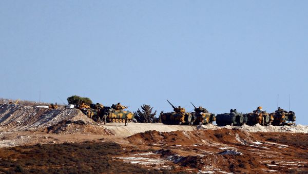 Turkish military vehicles are seen on the Turkish-Syrian border line in Reyhanli, Hatay province, Turkey, October 13, 2017 Turkish military vehicles are seen on the Turkish-Syrian border line in Reyhanli, Hatay province, Turkey, October 13, 2017 - Sputnik International