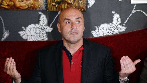 Serge Ayoub, the leader of the radical far-right movement Jeunesses Nationalistes Revolutionnaires, JNR (Revolutionary Nationalist Youth) gives a press conference on June 8, 2013 at Le Local cafe in Paris - Sputnik International