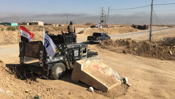 Members of Iraqi federal forces are seen near the oil fields in Kirkuk, Iraq October 16, 2017 Members of Iraqi federal forces are seen near the oil fields in Kirkuk, Iraq October 16, 2017 - Sputnik International