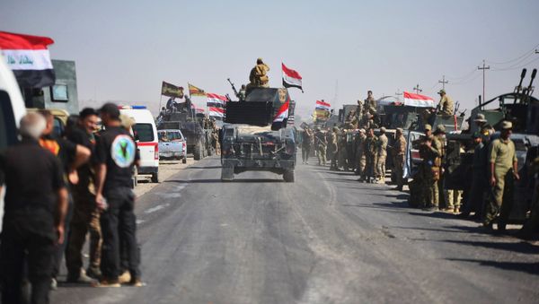 Members of Iraqi federal forces gather to continue to advance in military vehicles in Kirkuk, Iraq October 16, 2017 Members of Iraqi federal forces gather to continue to advance in military vehicles in Kirkuk, Iraq October 16, 2017 - Sputnik International