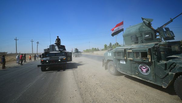 Members of Iraqi federal forces gather to continue to advance in military vehicles in Kirkuk, Iraq Members of Iraqi federal forces gather to continue to advance in military vehicles in Kirkuk, Iraq - Sputnik International