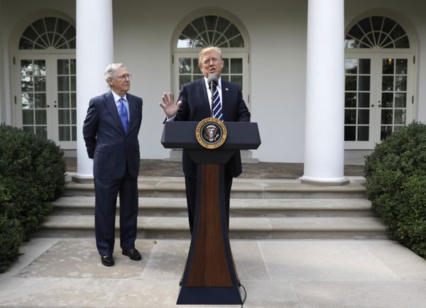 President Donald Trump speaks as Senate Majority Leader Mitch McConnell, R-Ky., listens in the Rose Garden at the White House, Monday, Oct. 16, 2017, in Washington. - Sputnik International