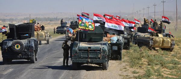 Members of Iraqi federal forces gather to continue to advance in military vehicles in Kirkuk, Iraq October 16, 2017. - Sputnik International