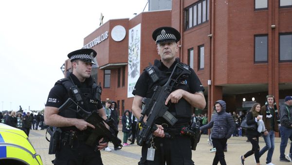 Armed police outside Celtic Park prior to the Scottish Premiership soccer match at Celtic Park in Glasgow, Scotland, Saturday Sept. 16, 2017 - Sputnik International