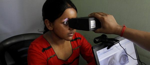An Indian girl, left, gets her retina scanned as she enrolls for Aadhar, India’s unique identification project in Kolkata, India, Wednesday, May 16, 2012 An Indian girl, left, gets her retina scanned as she enrolls for Aadhar, India’s unique identification project in Kolkata, India, Wednesday, May 16, 2012 - Sputnik International