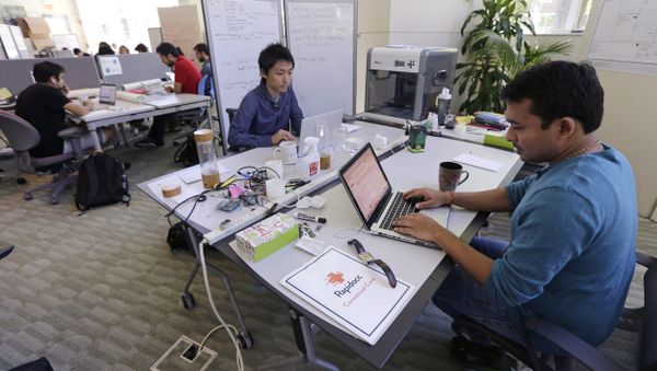 In this Thursday, June 30, 2016 photo, Babson College graduate school alumnus Abhinav Sureka, of Mumbai, India, right, types in his work space at the college in Wellesley, Mass. In this Thursday, June 30, 2016 photo, Babson College graduate school alumnus Abhinav Sureka, of Mumbai, India, right, types in his work space at the college in Wellesley, Mass. - Sputnik International