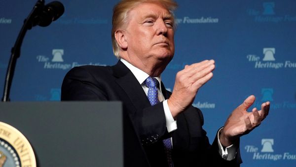 US President Donald Trump claps before speaking at the Heritage Foundation’s President’s Club Meeting in Washington, US, October 17, 2017. US President Donald Trump claps before speaking at the Heritage Foundation’s President’s Club Meeting in Washington, US, October 17, 2017. - Sputnik International