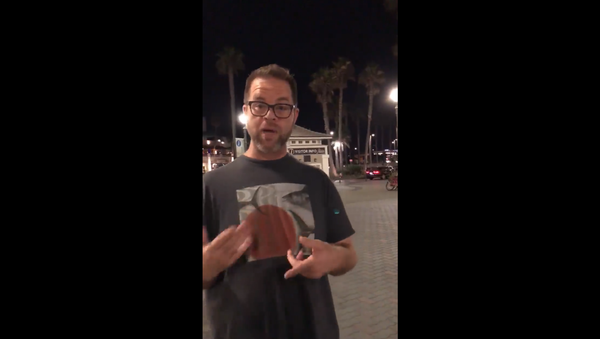 Anthony Miskulin harasses lesbian couple walking on California's Huntington Beach Pier Anthony Miskulin harasses lesbian couple walking on California's Huntington Beach Pier - Sputnik International