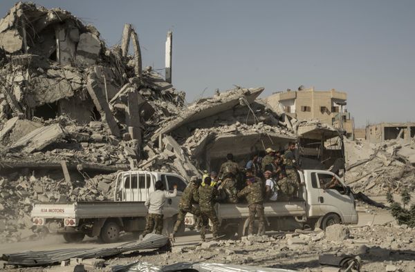 Members of the U.S.-backed Syrian Democratic Forces (SDF) ride near near the main traffic circle in Raqqa Syria, Friday, Oct. 20, 2017 Members of the U.S.-backed Syrian Democratic Forces (SDF) ride near near the main traffic circle in Raqqa Syria, Friday, Oct. 20, 2017 - Sputnik International