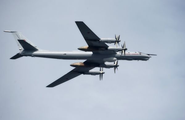 The Alexander Mozhaisky Tu-95 strategic bomber and missile platform during the Main Naval Parade to mark Russian Navy Day in St. Petersburg - Sputnik International
