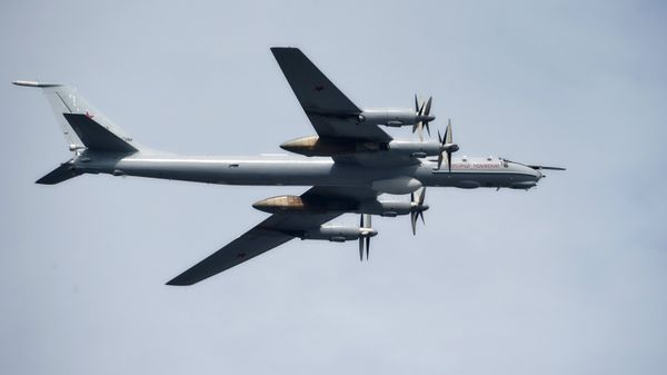 The Alexander Mozhaisky Tu-95 strategic bomber and missile platform during the Main Naval Parade to mark Russian Navy Day in St. Petersburg - Sputnik International